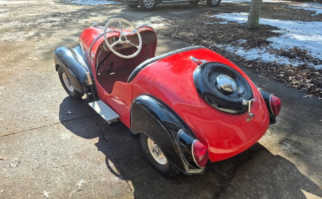 1954 IHLE Schottenring CarConvertible 016 Red and black Black vinyl Kohler 305-cc L-head four-stroke single